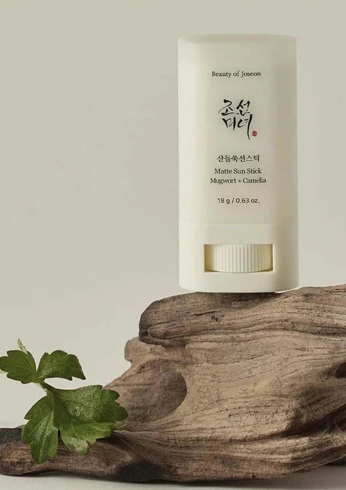 Beauty of Joseon stick on a wooden surface with a neutral background
